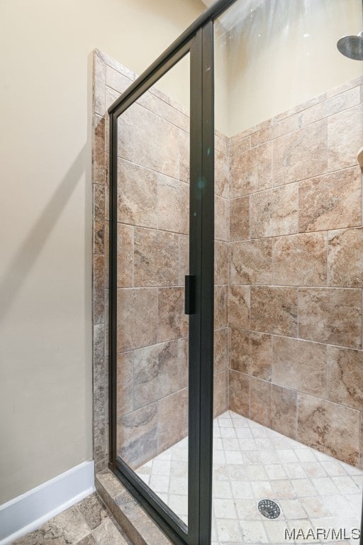 bathroom with an enclosed shower