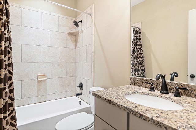 full bathroom with shower / bath combination with curtain, vanity with extensive cabinet space, and toilet