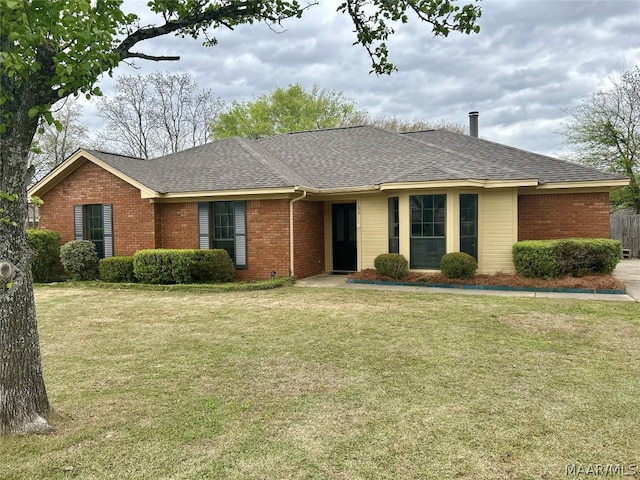 ranch-style house with a front lawn