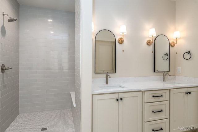 bathroom featuring vanity and a tile shower