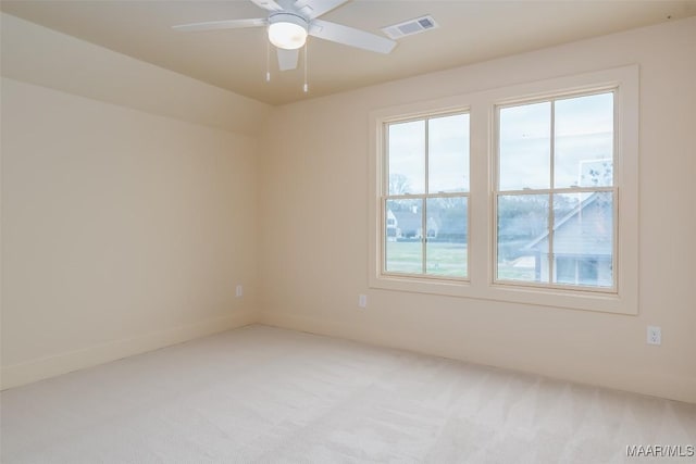 empty room with carpet floors and ceiling fan