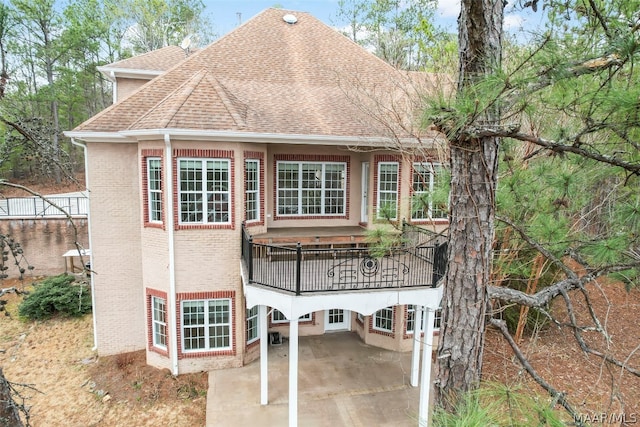 rear view of house with a carport