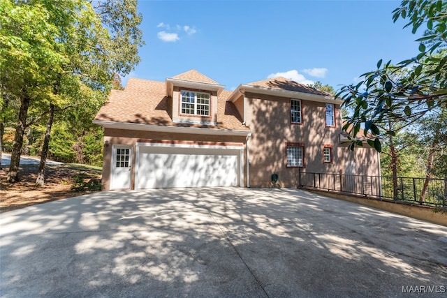 view of front of house with a garage