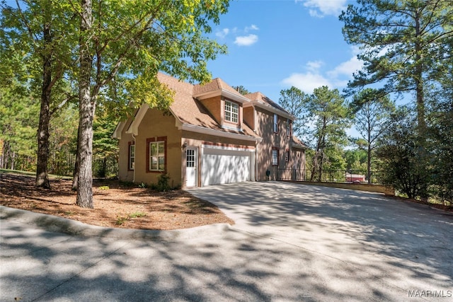 view of front of home featuring a garage