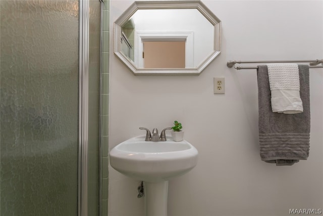 bathroom featuring walk in shower