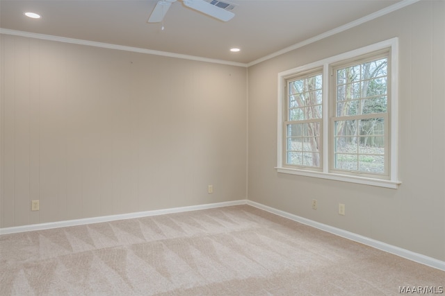 unfurnished room featuring a healthy amount of sunlight and light carpet