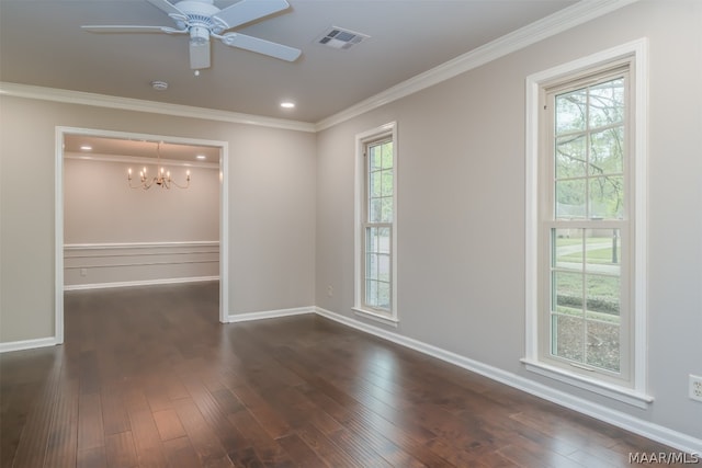 empty room featuring dark hardwood / wood-style flooring, ceiling fan with notable chandelier, and ornamental molding