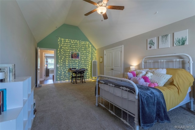 bedroom with ceiling fan, high vaulted ceiling, and carpet