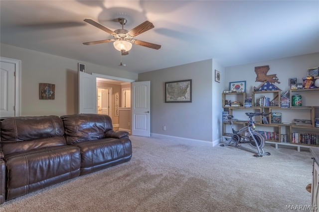 living room featuring ceiling fan and light carpet