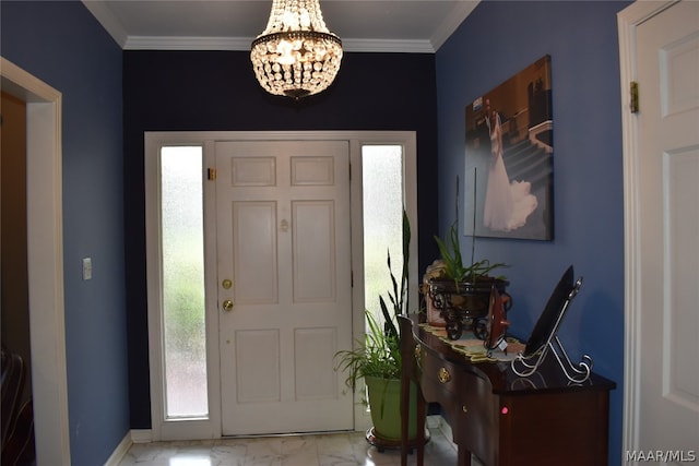 entrance foyer with ornamental molding and a chandelier