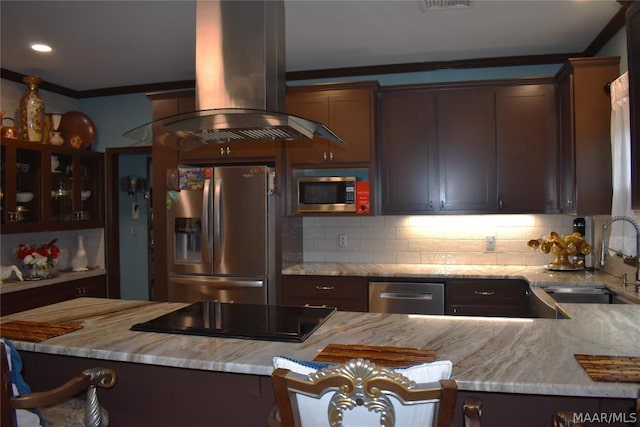 kitchen featuring sink, dark brown cabinets, island exhaust hood, and stainless steel appliances