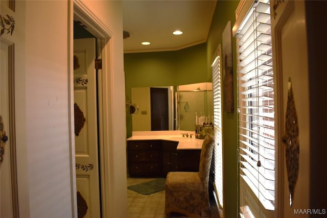 bathroom featuring vanity and a shower with shower door