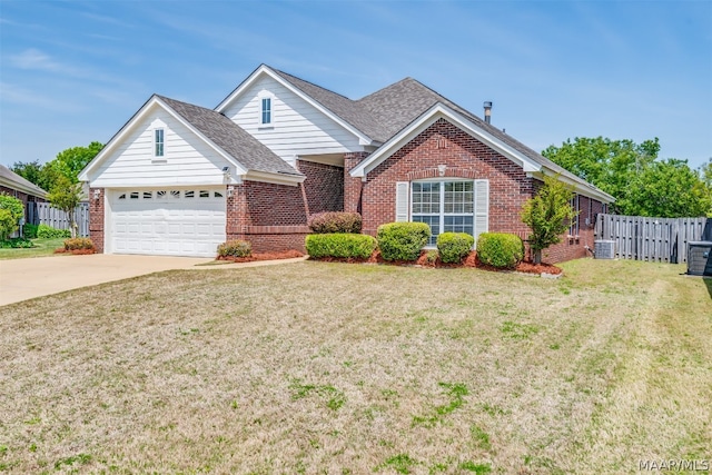 view of front of house featuring a front yard and a garage