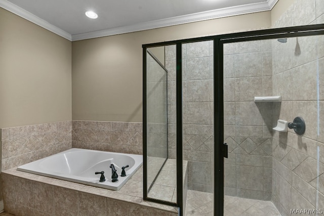 bathroom with crown molding and independent shower and bath