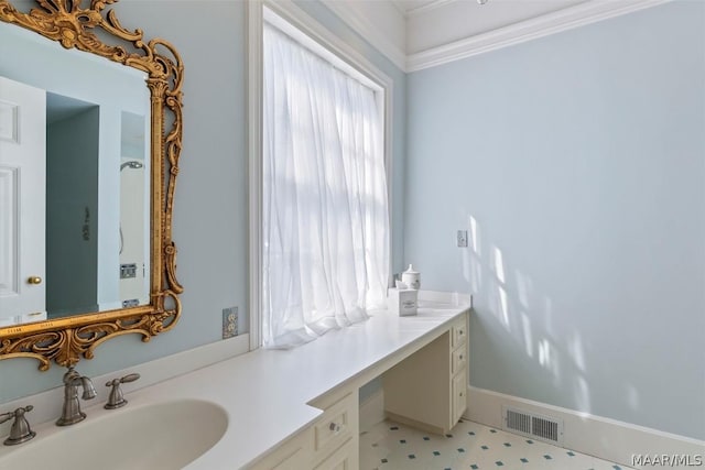 bathroom with baseboards, visible vents, and vanity