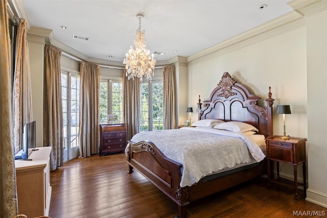 bedroom featuring dark wood-style flooring, visible vents, and crown molding