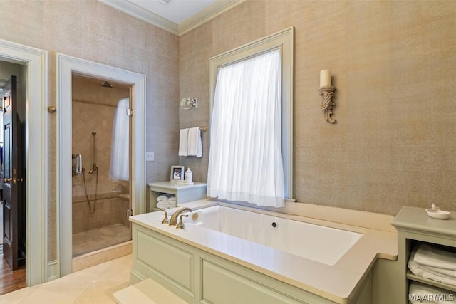 bathroom with a bath, wallpapered walls, a shower stall, and crown molding