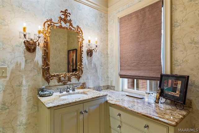 bathroom featuring a wood stove, wallpapered walls, and vanity