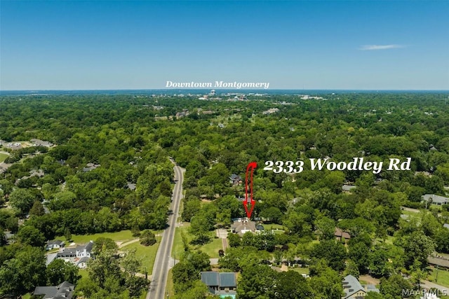 bird's eye view featuring a view of trees