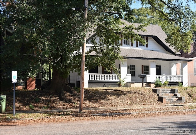 view of front of home featuring covered porch