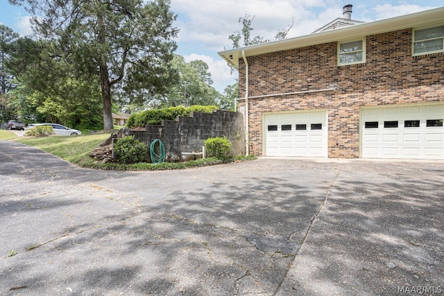 view of home's exterior with a garage