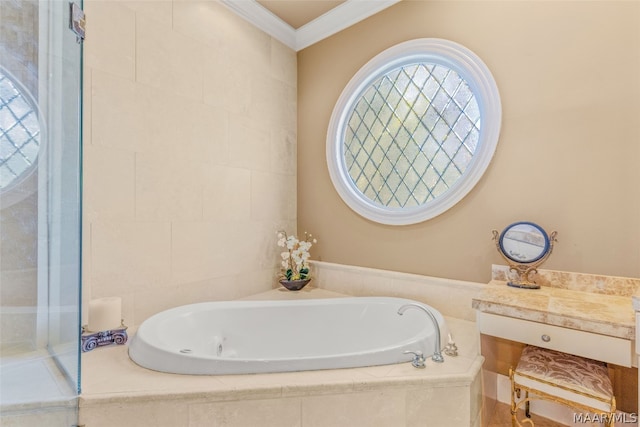 bathroom with crown molding and tiled bath