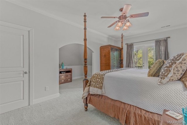 bedroom with ceiling fan, carpet flooring, french doors, and crown molding