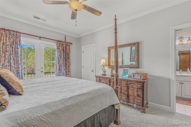 bedroom featuring crown molding, ensuite bath, access to exterior, light colored carpet, and ceiling fan