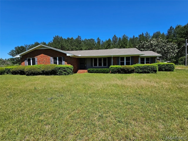 ranch-style house with a front yard