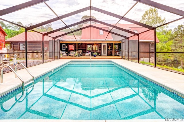 view of pool featuring a patio and a lanai