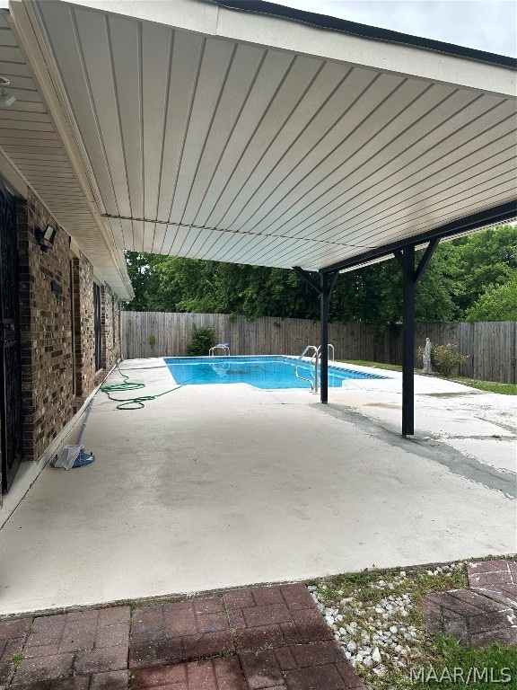 view of pool with a patio