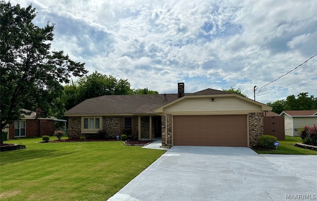 ranch-style house featuring a front yard and a garage