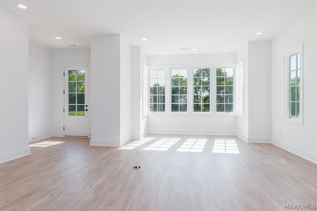 unfurnished room featuring light wood-type flooring