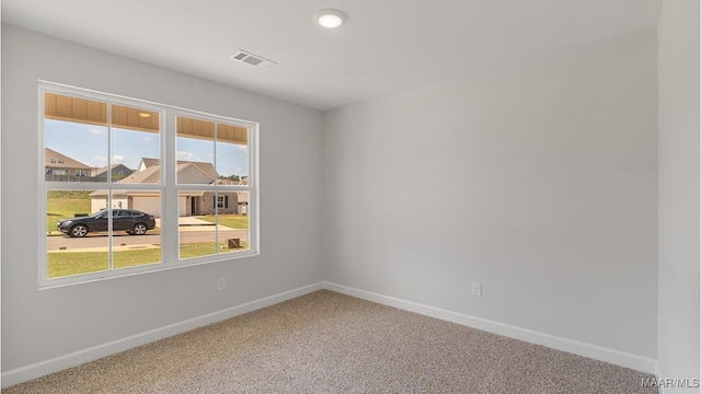 view of carpeted spare room