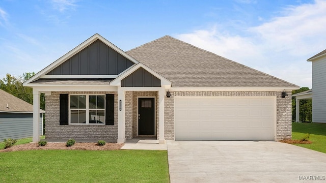 craftsman inspired home with a garage and a front yard