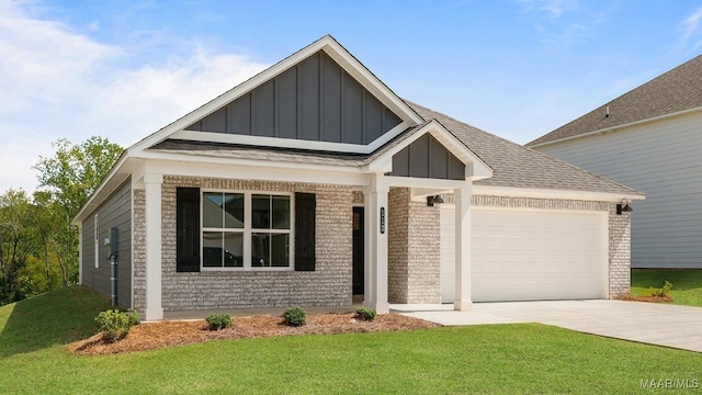 view of front facade featuring a garage and a front lawn