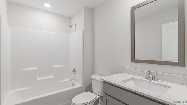 full bathroom with toilet, vanity, and bathtub / shower combination