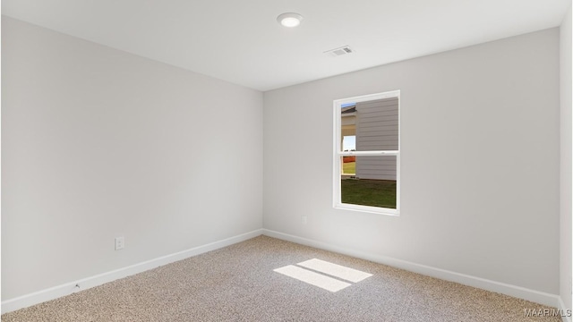 view of carpeted spare room