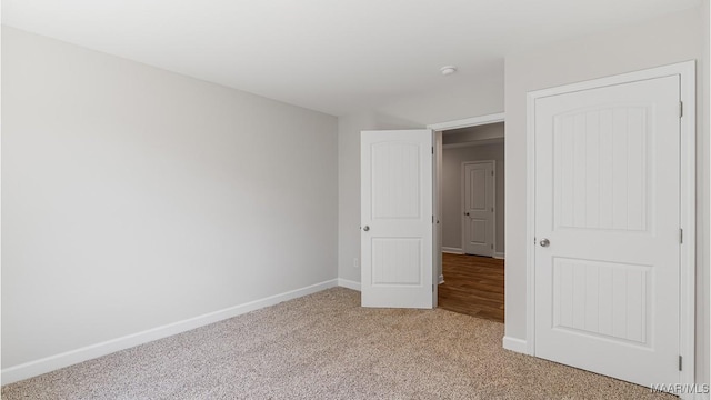 unfurnished bedroom featuring carpet floors