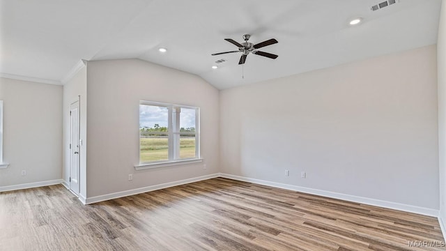 6601 Firefly Ln, Montgomery, AL 36116 - unfurnished room featuring wood finished floors, a ceiling fan, recessed lighting, vaulted ceiling, and baseboards