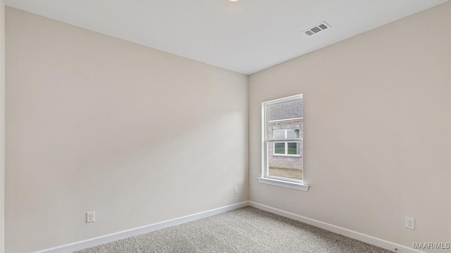 6601 Firefly Ln, Montgomery, AL 36116 - spare room with baseboards and light carpet