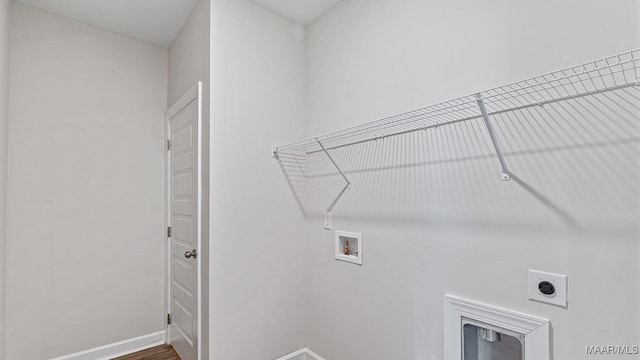 6601 Firefly Ln, Montgomery, AL 36116 - clothes washing area with hookup for a washing machine, electric dryer hookup, and baseboards