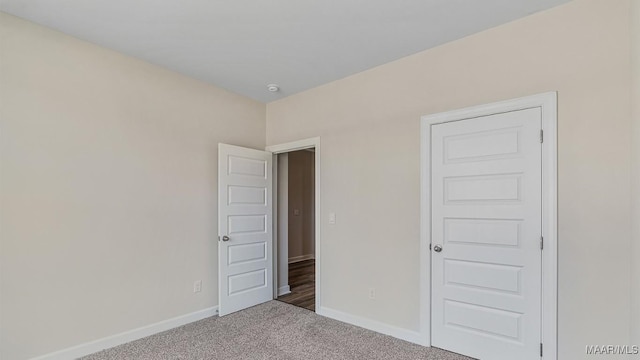 6601 Firefly Ln, Montgomery, AL 36116 - unfurnished bedroom with carpet and baseboards