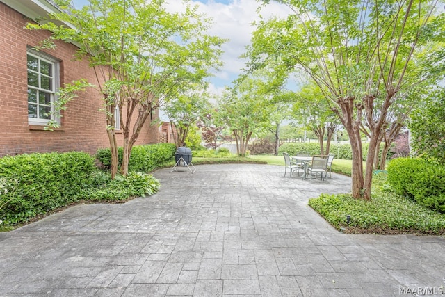 view of property's community featuring a patio