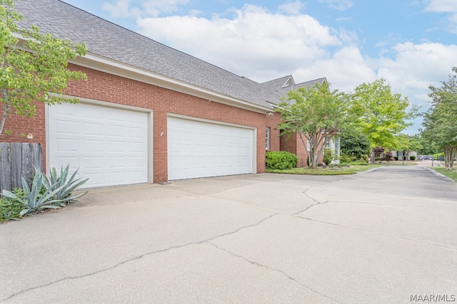 exterior space with a garage