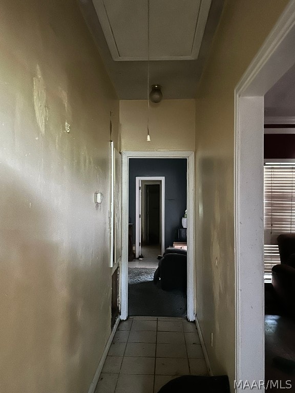 hallway featuring tile floors