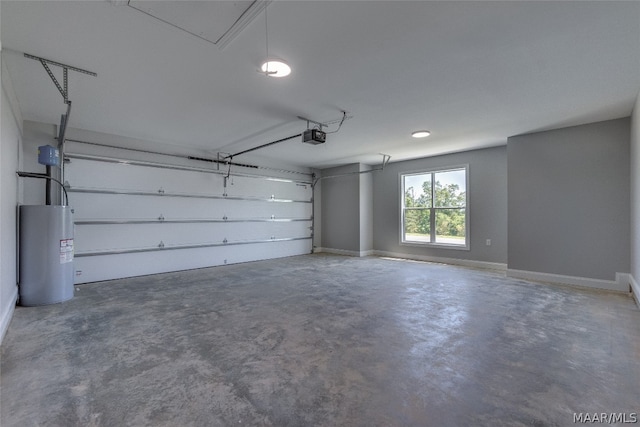 garage with water heater and a garage door opener