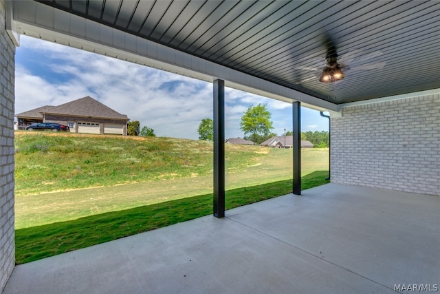 view of patio / terrace featuring ceiling fan