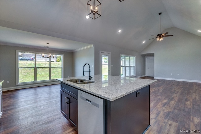 kitchen with sink, decorative light fixtures, dishwasher, lofted ceiling, and a center island with sink