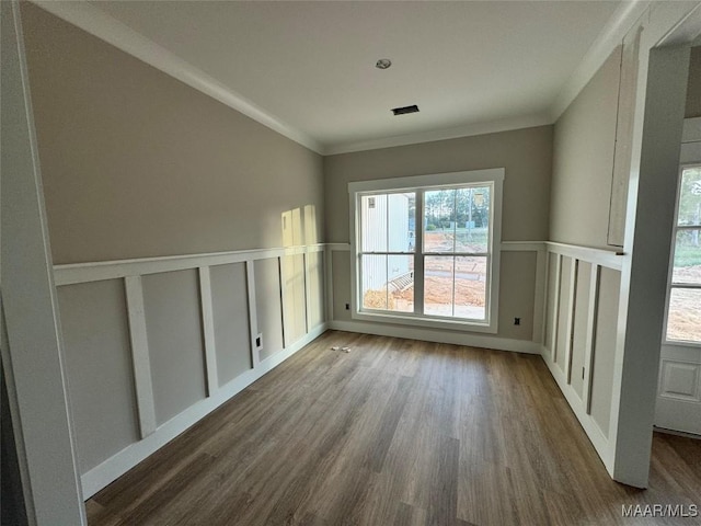 unfurnished room with crown molding and dark hardwood / wood-style floors